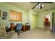 Versatile bedroom with a desk, closet, and an adjoining dining area at 15212 N 37Th Ave, Phoenix, AZ 85053