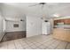 Open-concept kitchen with white appliances and ample counter space for meal preparation at 1643 W Naranja Ave, Mesa, AZ 85202