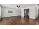 Comfortable living room with wood floors, ready for your personal touch and decor at 1643 W Naranja Ave, Mesa, AZ 85202