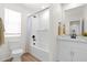 Clean and bright bathroom featuring a tub-shower combination, modern vanity, and neutral finishes at 16875 N 12Th St # 31, Phoenix, AZ 85022