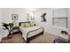 Cozy bedroom with natural light, neutral tones, carpet, and stylish decor at 16875 N 12Th St # 31, Phoenix, AZ 85022