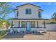 Charming two-story home featuring a light blue front door and a welcoming covered porch at 16875 N 12Th St # 31, Phoenix, AZ 85022