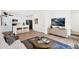 Bright open-concept living area showcasing a stylish kitchen, comfortable seating, and contemporary decor at 16875 N 12Th St # 31, Phoenix, AZ 85022