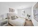 Cozy main bedroom with a comfortable bed, soft lighting, and stylish décor at 16875 N 12Th St # 31, Phoenix, AZ 85022