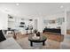 Open concept living room showcases seamless flow to a modern kitchen and dining area, perfect for entertaining guests at 16875 N 12Th St # 33, Phoenix, AZ 85020