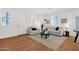 Cozy living room with stylish decor and ample natural light, complemented by wood-look flooring and a comfortable seating arrangement at 16875 N 12Th St # 33, Phoenix, AZ 85020