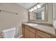 Light and airy bathroom with granite vanity and a spacious shower at 1733 N Miller Rd, Scottsdale, AZ 85257