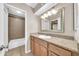 Neutral bathroom featuring a vanity area and a walk-in shower at 1733 N Miller Rd, Scottsdale, AZ 85257