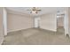 Spacious bedroom with neutral walls and ceiling fan, offering a tranquil retreat at 1733 N Miller Rd, Scottsdale, AZ 85257