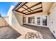 Private backyard patio with custom pergola for outdoor living and entertaining space at 1733 N Miller Rd, Scottsdale, AZ 85257