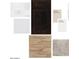 Selection of attractive interior finishes with a dark cabinet, light countertops, and neutral paint colors at 18174 W Larkspur Dr, Goodyear, AZ 85338