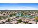 Community aerial view showcases lakeside homes with tile roofs, lush landscaping, and scenic views at 1896 E Stephens Dr, Tempe, AZ 85283