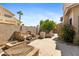 The backyard has a custom water feature and built in BBQ for stylish outdoor entertaining at 1896 E Stephens Dr, Tempe, AZ 85283