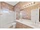 Bathroom with dual sink vanity, large mirror, and shower-tub combo with glass door at 1896 E Stephens Dr, Tempe, AZ 85283