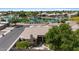 Attractive single-story home features a well-maintained tile roof and mature trees near a picturesque lake at 1896 E Stephens Dr, Tempe, AZ 85283