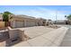 Spacious three-car garage with a long driveway in a well-kept neighborhood at 1896 E Stephens Dr, Tempe, AZ 85283