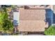 Aerial perspective of a home, highlighting the roof, covered patio, and mature trees at 19824 N 14Th Pl, Phoenix, AZ 85024