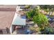 Bird's eye view of a home featuring a shaded patio, lush landscaping, and an outdoor living space at 19824 N 14Th Pl, Phoenix, AZ 85024