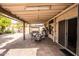 An expansive, covered patio area with ample seating offers an ideal space for outdoor dining and relaxation at 19824 N 14Th Pl, Phoenix, AZ 85024