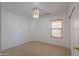 Cozy bedroom with a ceiling fan and a window offering natural light at 1983 W Allens Peak Rd, Queen Creek, AZ 85144