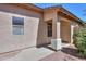 Exterior showcasing the front entry and neutral paint scheme at 1983 W Allens Peak Rd, Queen Creek, AZ 85144