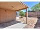 Concrete patio offers a perfect outdoor space to relax, with views of the well maintained backyard and desert landscaping at 1983 W Allens Peak Rd, Queen Creek, AZ 85144