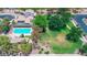 A community pool surrounded by homes and greenery at 21050 E Tierra Grande --, Queen Creek, AZ 85142