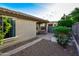 Spacious backyard with a covered patio, mature trees, and a tidy garden area at 21050 E Tierra Grande --, Queen Creek, AZ 85142