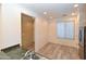 Bright dining area features wood-look floors, a large window with blinds, and easy access to the kitchen at 21050 E Tierra Grande --, Queen Creek, AZ 85142