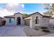 Charming single-story home featuring a tile roof, desert landscaping and neutral-toned stucco facade at 21050 E Tierra Grande --, Queen Creek, AZ 85142