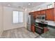 Bright kitchen with stainless steel appliances, granite countertops and wood-look floors at 21050 E Tierra Grande --, Queen Creek, AZ 85142