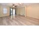 Well-lit living room featuring sleek flooring, backyard access, and an open layout perfect for entertaining at 21050 E Tierra Grande --, Queen Creek, AZ 85142