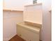 Organized walk-in closet with shelving, providing ample storage space for clothing and accessories at 21050 E Tierra Grande --, Queen Creek, AZ 85142