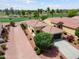 Expansive aerial view of house with lush landscaping and golf course view at 22504 N San Ramon Dr, Sun City West, AZ 85375