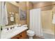 Cozy bathroom with bathtub and shower, white tile accents, and decor at 22504 N San Ramon Dr, Sun City West, AZ 85375