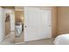 Bedroom with large mirrored closet and a glimpse into the Primary bedroom beyond at 22504 N San Ramon Dr, Sun City West, AZ 85375