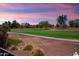 Enjoy sunset views of the lush green golf course from your backyard at 22504 N San Ramon Dr, Sun City West, AZ 85375