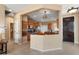 Bright kitchen featuring wood cabinets, stainless steel appliances, and an open layout at 22504 N San Ramon Dr, Sun City West, AZ 85375