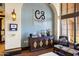 Corte Bella Golf Club lobby features a drink station, comfortable seating, and elegant decor at 22504 N San Ramon Dr, Sun City West, AZ 85375