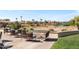Scenic patio seating offers stunning golf course views, perfect for relaxing and enjoying the outdoors at 22504 N San Ramon Dr, Sun City West, AZ 85375