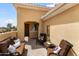 Outdoor patio area with comfortable seating, ideal for relaxing and enjoying the weather at 22504 N San Ramon Dr, Sun City West, AZ 85375
