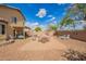 Spacious backyard featuring a patio, multiple seating areas and gravel landscaping at 2327 E Edna Ave, Phoenix, AZ 85022