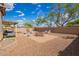 Spacious backyard featuring a patio, seating areas, and gravel landscaping at 2327 E Edna Ave, Phoenix, AZ 85022
