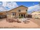 Expansive backyard featuring a patio perfect for outdoor dining and entertaining with beautiful landscaping at 2327 E Edna Ave, Phoenix, AZ 85022