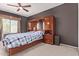 Comfortable bedroom with a decorative headboard, complemented by warm colors and natural light at 2327 E Edna Ave, Phoenix, AZ 85022