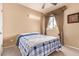 Cozy bedroom featuring a ceiling fan and a window, perfect for a good night's sleep at 2327 E Edna Ave, Phoenix, AZ 85022