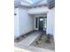 Close-up of a front door with a walkway and desert landscaping at 24088 S 218Th Pl, Queen Creek, AZ 85142