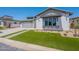 Single-Gathering home with attractive modern architecture, landscaping and a two-car garage at 24088 S 218Th Pl, Queen Creek, AZ 85142