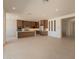 Expansive kitchen and dining area with recessed lighting and tile floors at 24088 S 218Th Pl, Queen Creek, AZ 85142