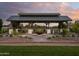 Beautiful community outdoor gathering space with seating and landscaped grounds with mountain views at 24088 S 218Th Pl, Queen Creek, AZ 85142